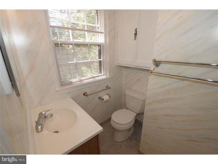 237 Hamilton Road Merion Station, PA 19066 - Photo 11 of 17 a bathroom with a sink toilet and shower