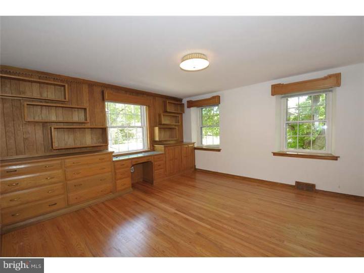 237 Hamilton Road Merion Station, PA 19066 - Photo 9 of 17 an empty room with wooden floor and windows