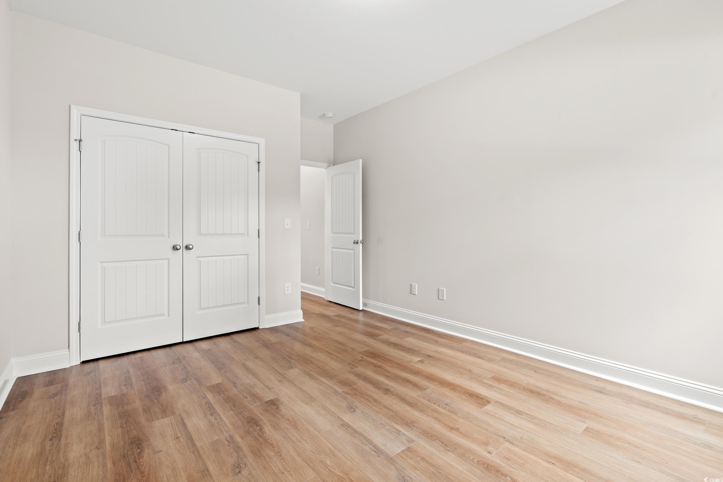 2612 Old Charleston Road Georgetown, SC 29440 - Photo 8 of 34 Unfurnished bedroom featuring light wood-style flo