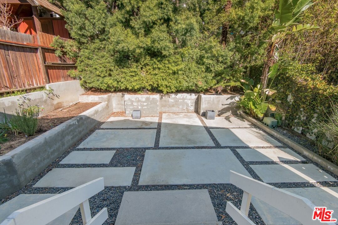 8531 Walnut Drive Los Angeles, CA 90046 - Photo 16 of 17 a view of a yard with an outdoor space