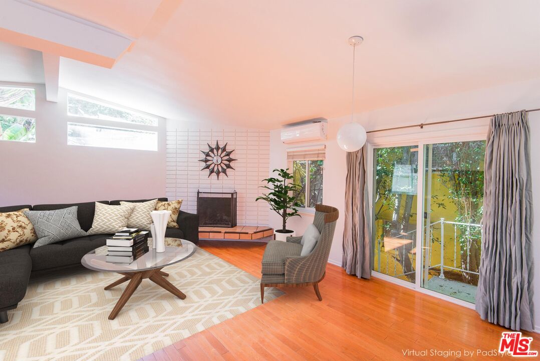 8531 Walnut Drive Los Angeles, CA 90046 - Photo 3 of 17 a living room with furniture and a large window