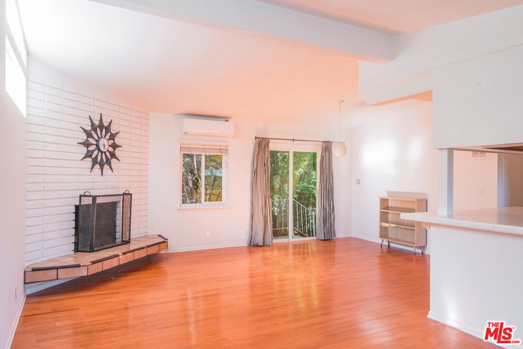 8531 Walnut Drive Los Angeles, CA 90046 - Photo 5 of 17 a view of livingroom with furniture workspace and a window