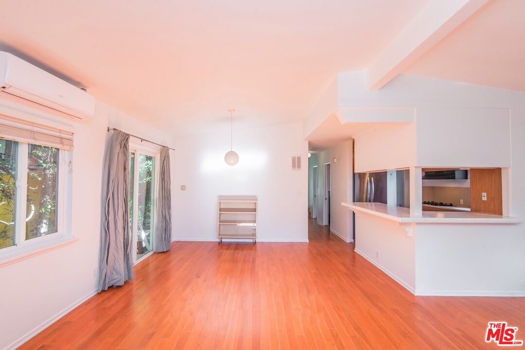 8531 Walnut Drive Los Angeles, CA 90046 - Photo 6 of 17 a view of a kitchen with furniture and wooden floor