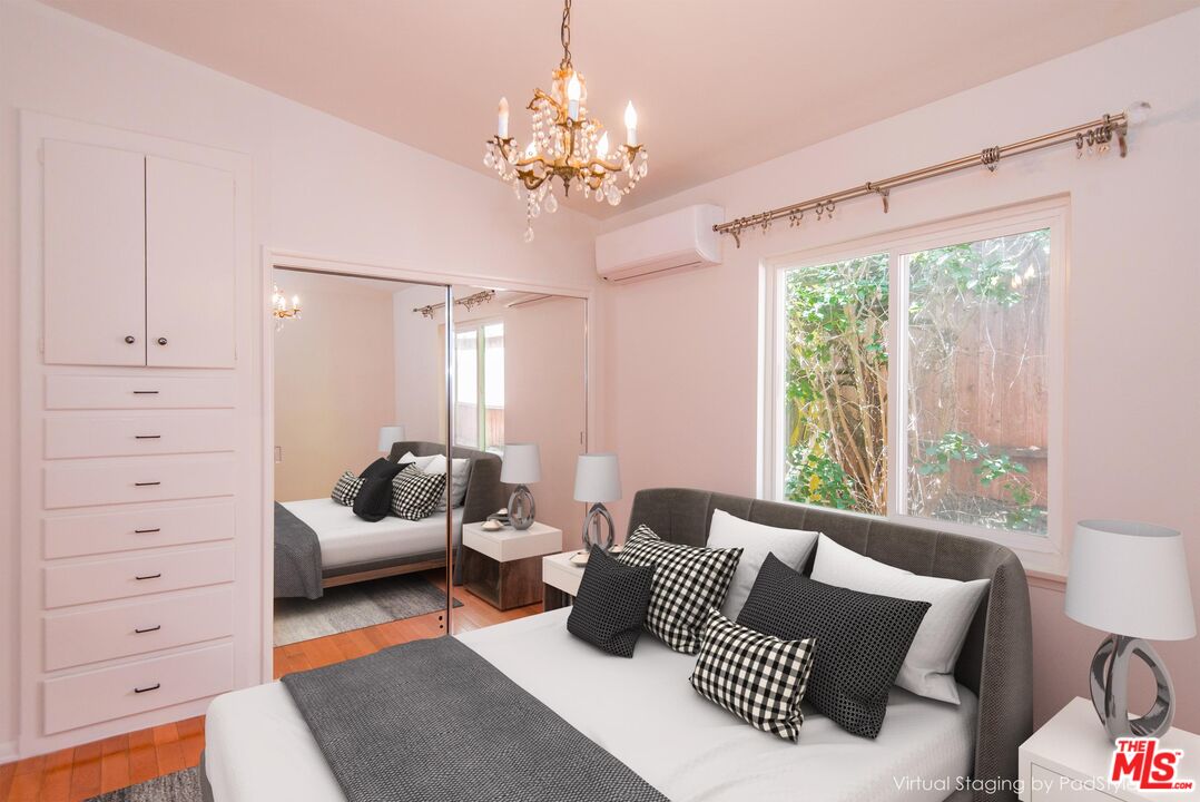 8531 Walnut Drive Los Angeles, CA 90046 - Photo 9 of 17 a living room with furniture and a chandelier