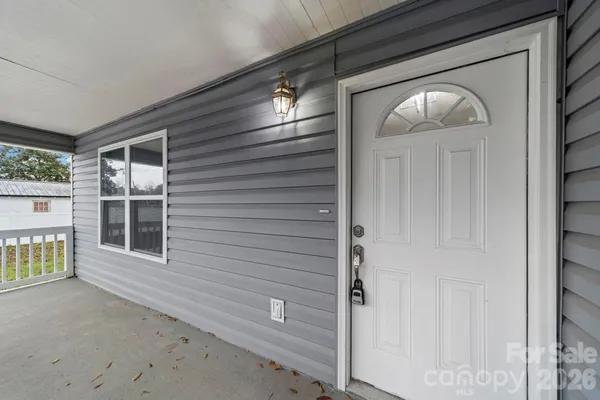 a view of front door and porch