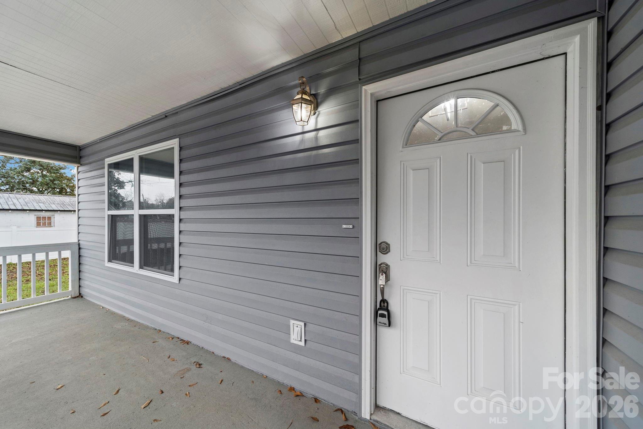 109 Haddock Road Northwest Orangeburg, SC 29115 - Photo 11 of 48 a view of a hallway with wooden floors and windows