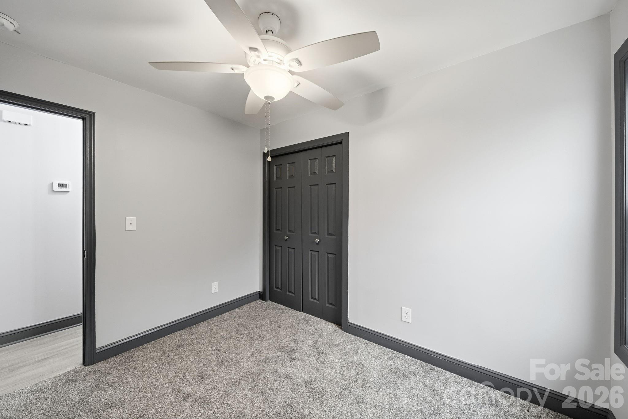 109 Haddock Road Northwest Orangeburg, SC 29115 - Photo 31 of 48 an empty room with a ceiling fan