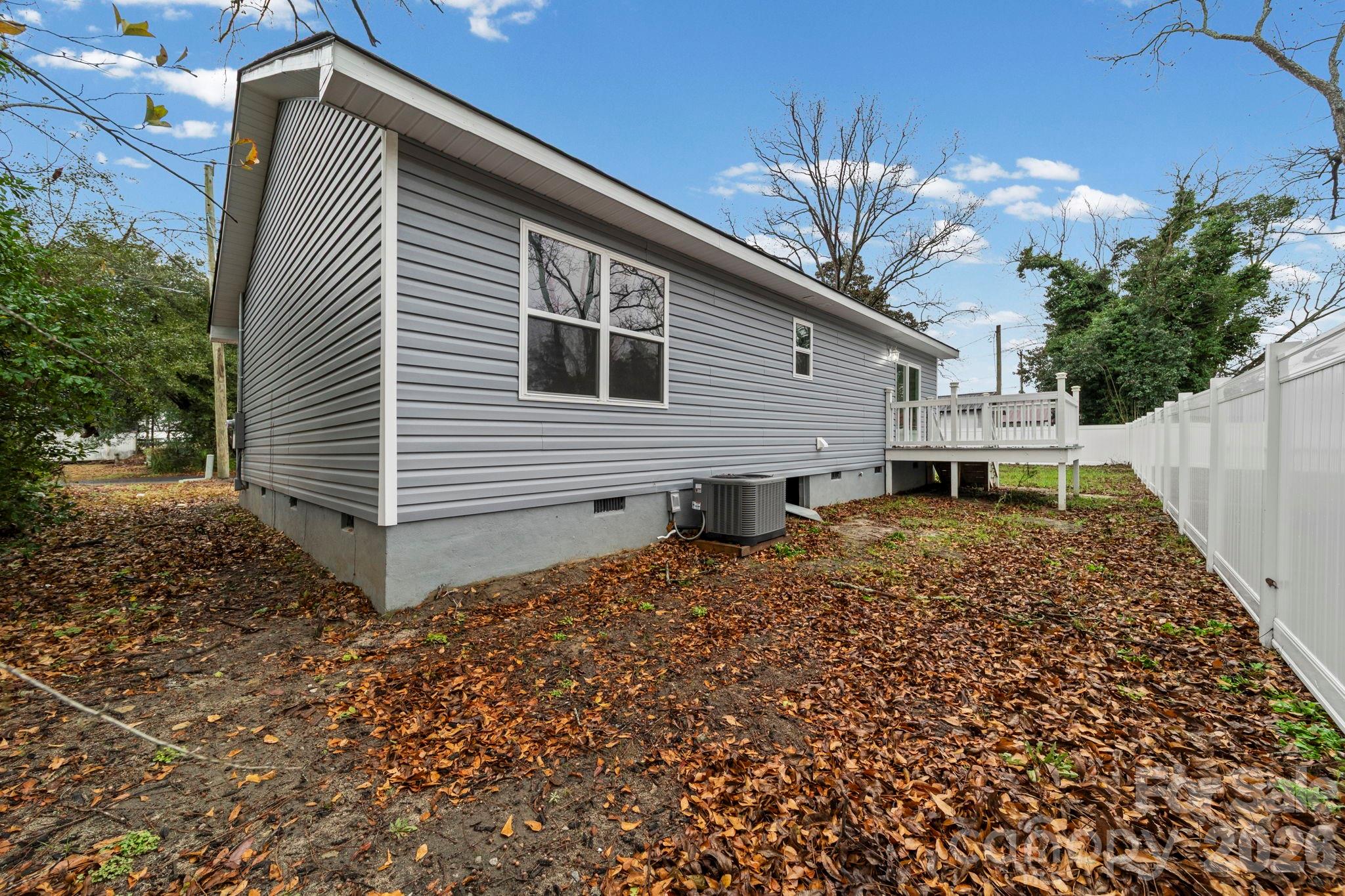 109 Haddock Road Northwest Orangeburg, SC 29115 - Photo 6 of 48 a house view with a backyard space