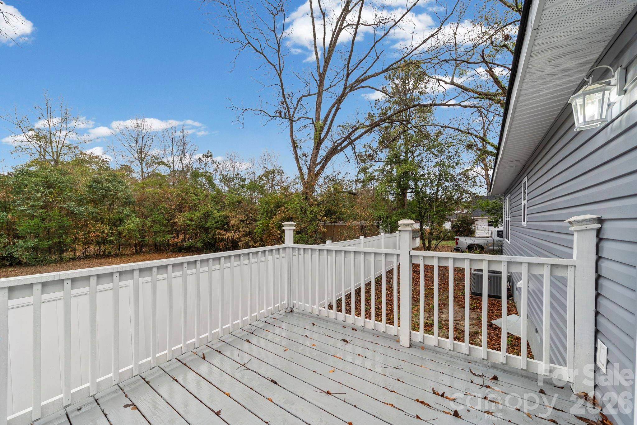 109 Haddock Road Northwest Orangeburg, SC 29115 - Photo 8 of 48 a view of a wooden roof deck