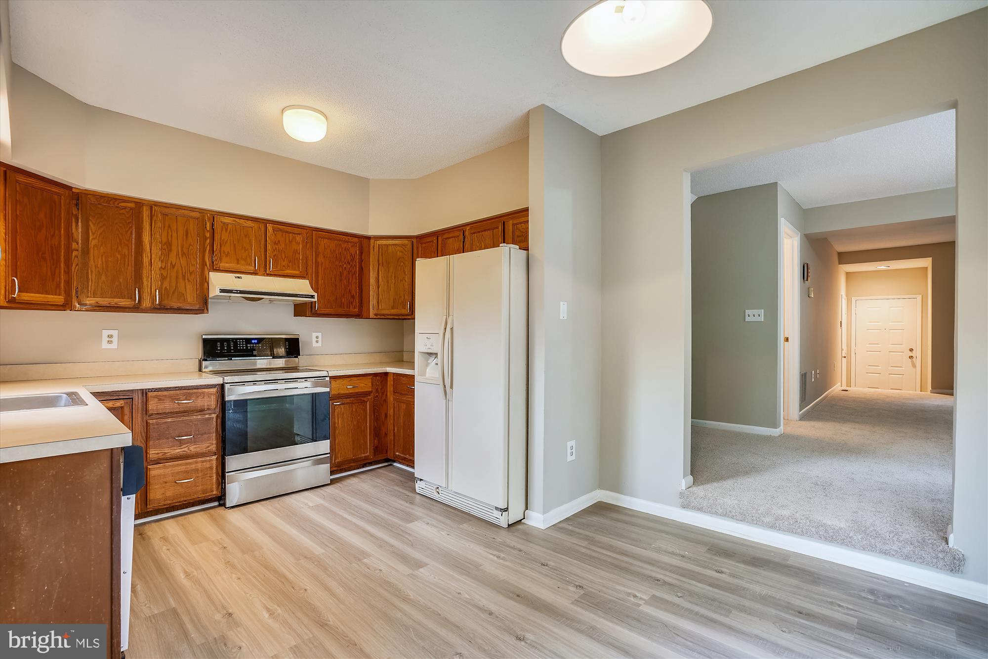 5479 Vantage Point Road, Unit 22 Columbia, MD 21044 - Photo 11 of 36 Kitchen has lots of cabinets, opens to dining room