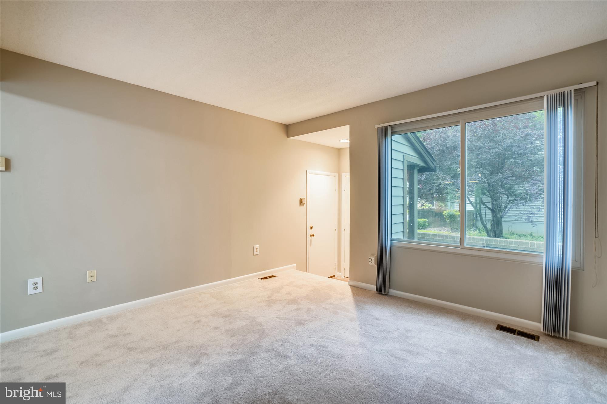 Living room has big windows