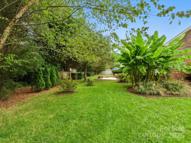 a view of a garden with a fountain
