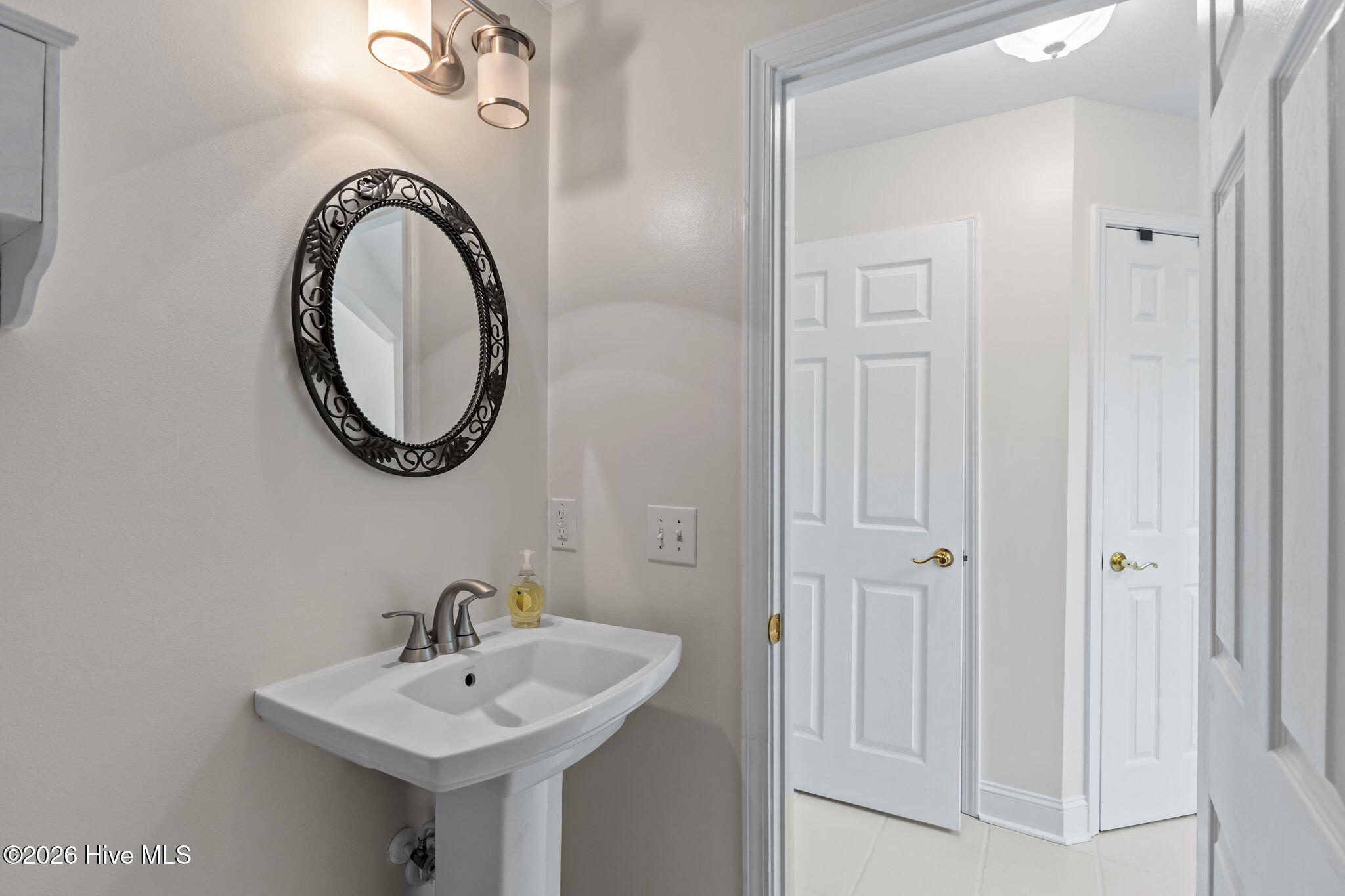 102 Shady Path Cedar Point, NC 28584 - Photo 15 of 36 Guest bath next to sunroom