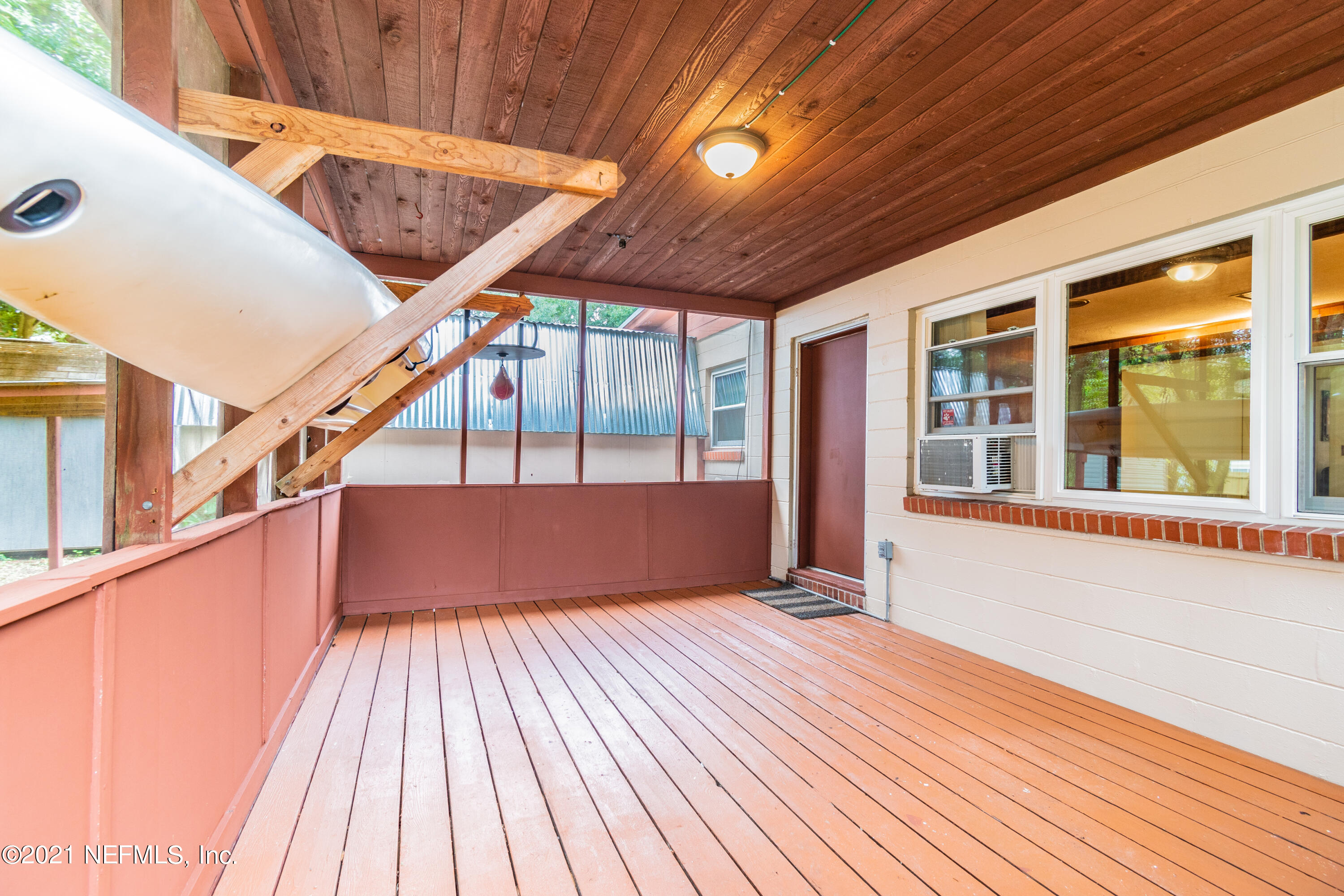 5816 Dickson Road Jacksonville, FL 32211 - Photo 11 of 37 Screened Porch with Canoe Rack
