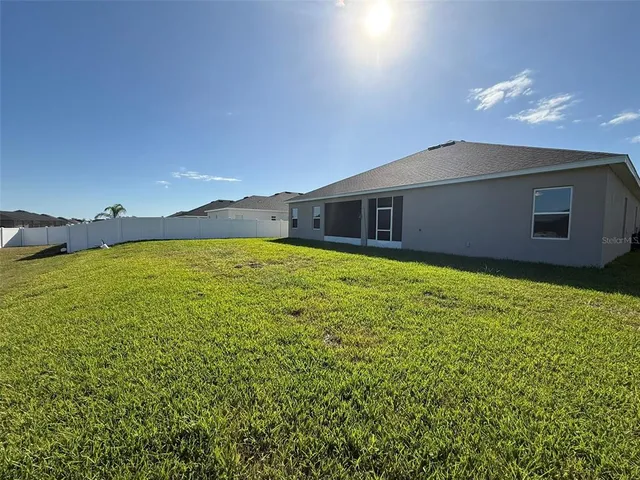 a large house with a garden