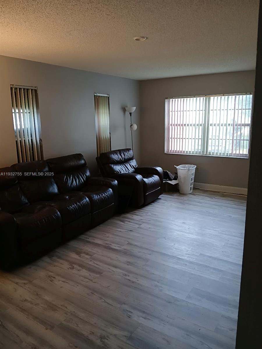 10210 Southwest 175th Street Miami, FL 33157 - Photo 4 of 14 a living room with furniture