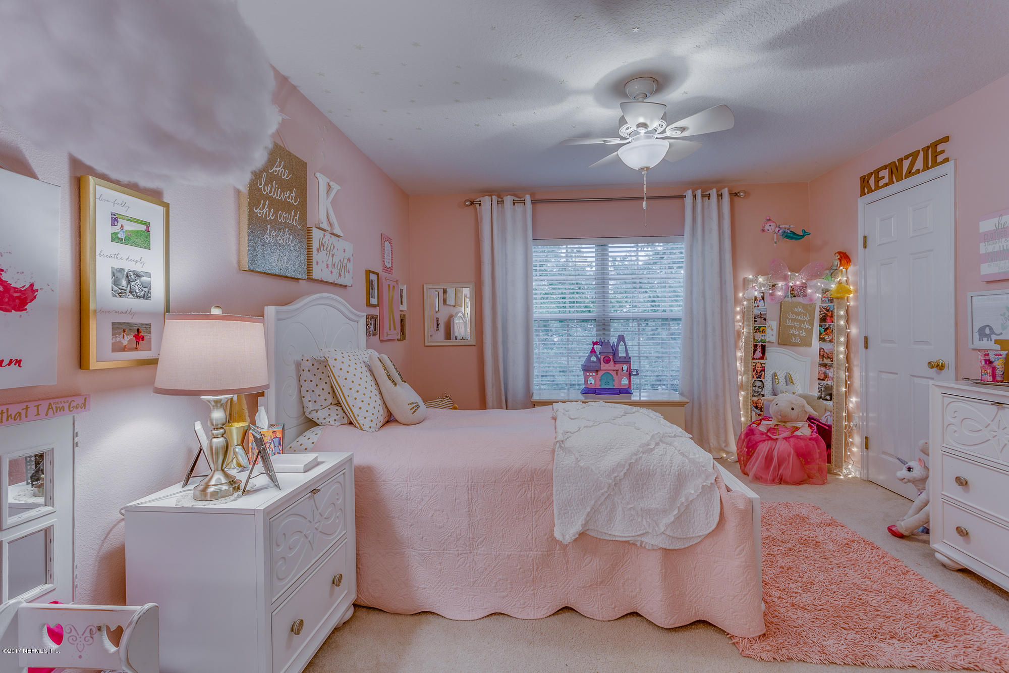 11113 Fallgate Point Court Jacksonville, FL 32256 - Photo 11 of 49 a bed room with a bed and a chandelier