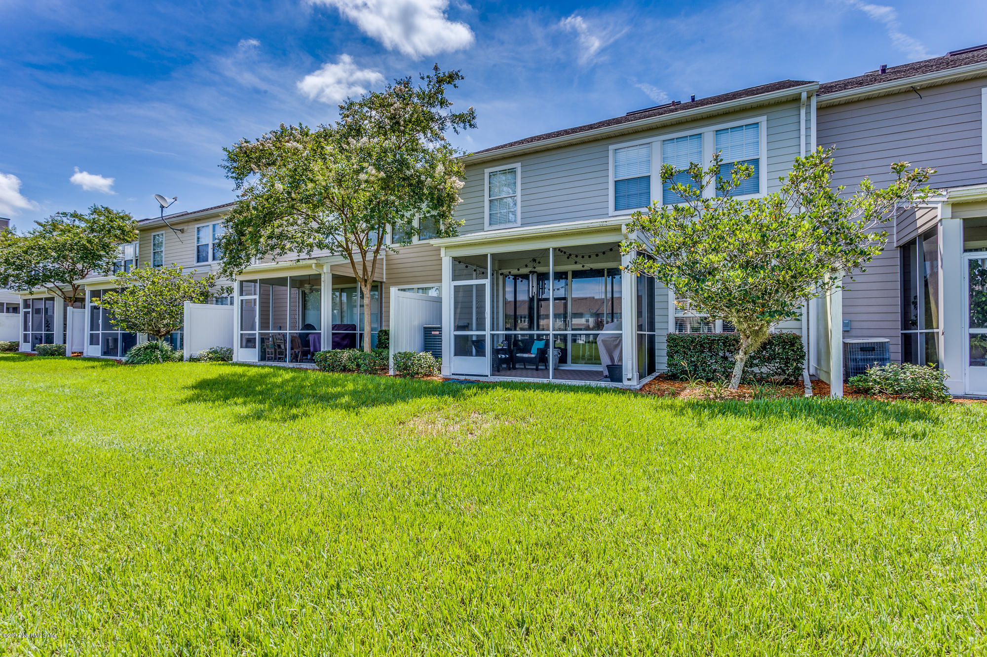 11113 Fallgate Point Court Jacksonville, FL 32256 - Photo 19 of 49 a view of a house with a yard