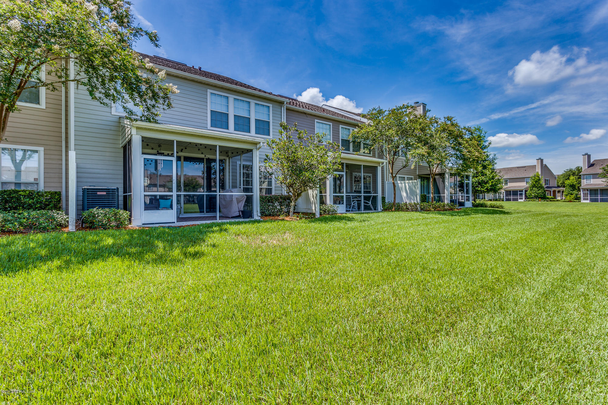 11113 Fallgate Point Court Jacksonville, FL 32256 - Photo 20 of 49 a view of a house with a yard porch and sitting area