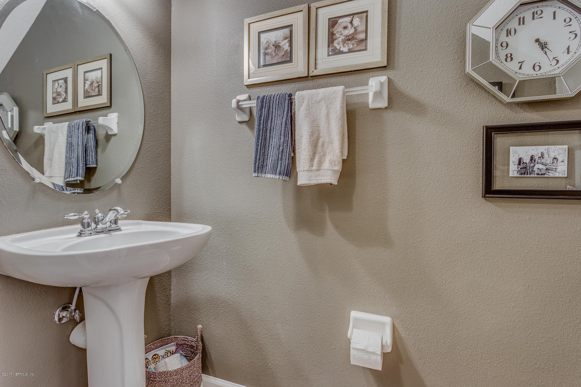 11113 Fallgate Point Court Jacksonville, FL 32256 - Photo 45 of 49 a bathroom with a sink and a mirror