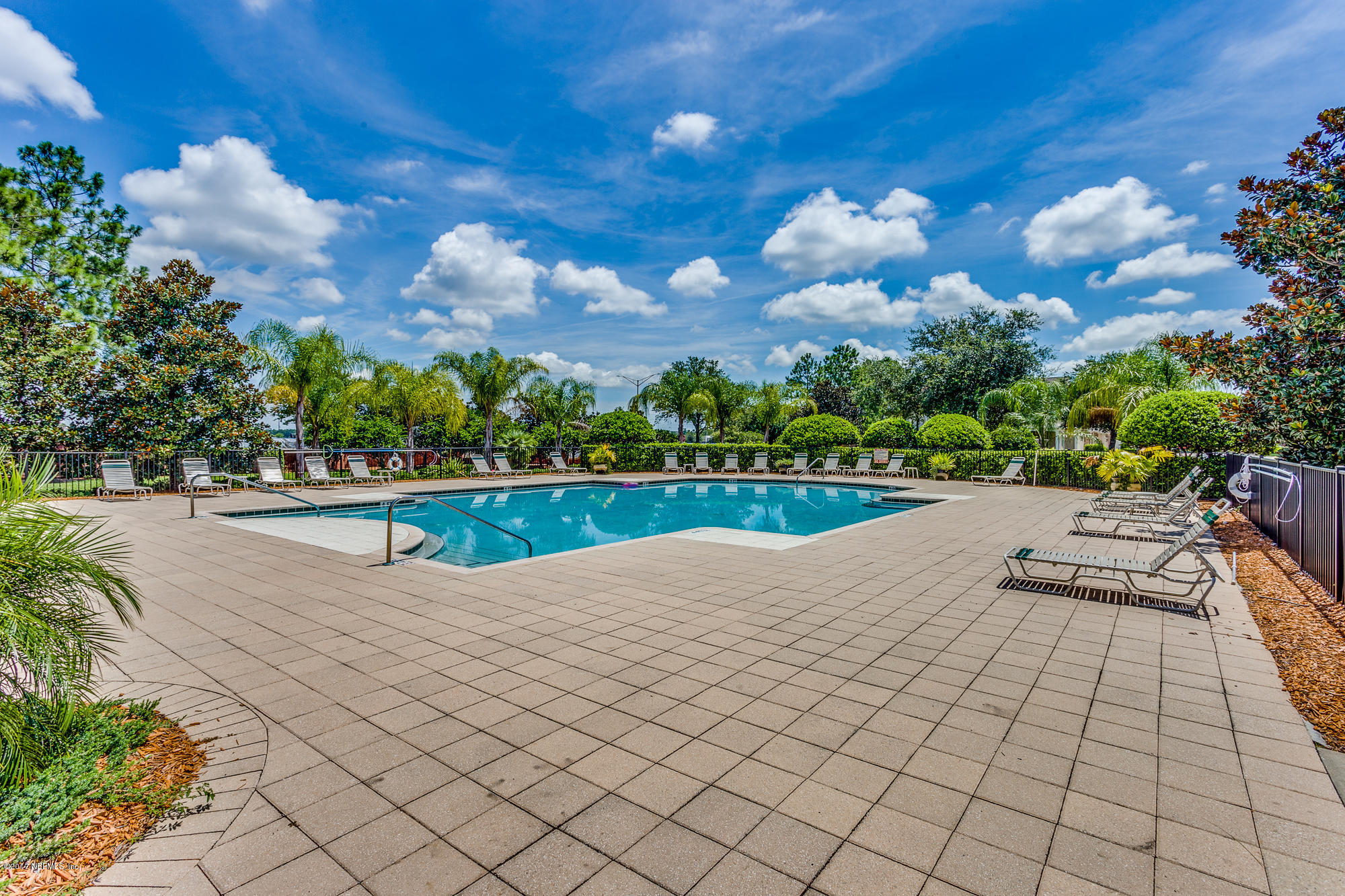 11113 Fallgate Point Court Jacksonville, FL 32256 - Photo 47 of 49 a view of swimming pool with outdoor space and trees in the background