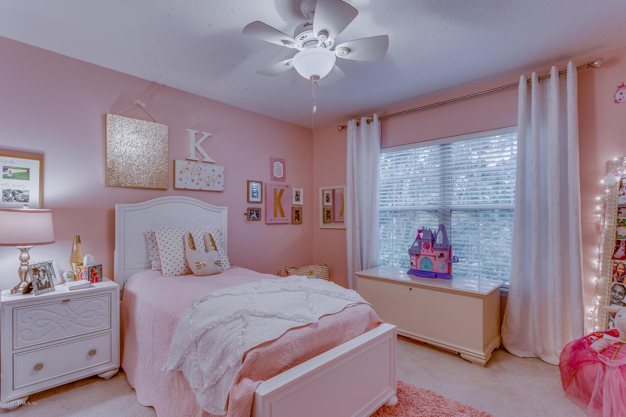11113 Fallgate Point Court Jacksonville, FL 32256 - Photo 10 of 49 a bedroom with a bed and a window