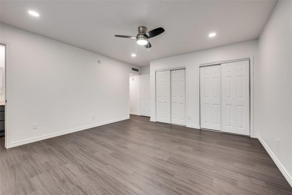 5412 Rice Drive The Colony, TX 75056 - Photo 15 of 17 a view of an empty room with wooden floor