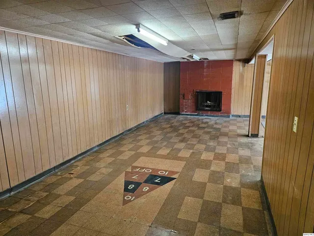 a view of balcony with wooden floor and outdoor space