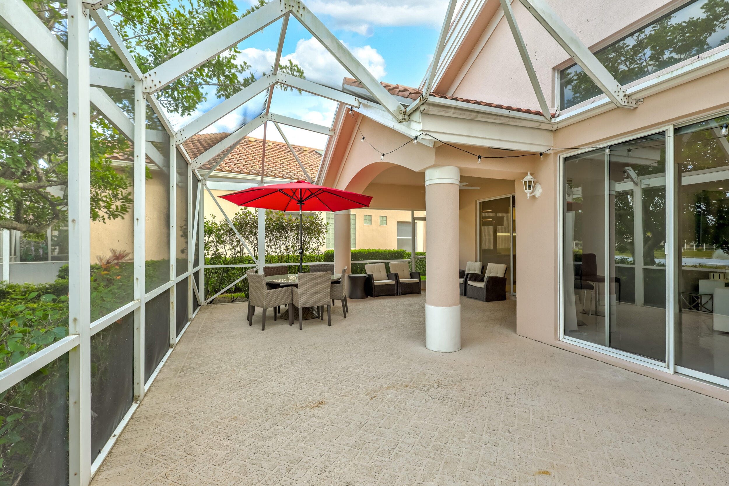 523 Eagleton Cove Trace Palm Beach Gardens, FL 33418 - Photo 36 of 43 Screened to Covered Lanai