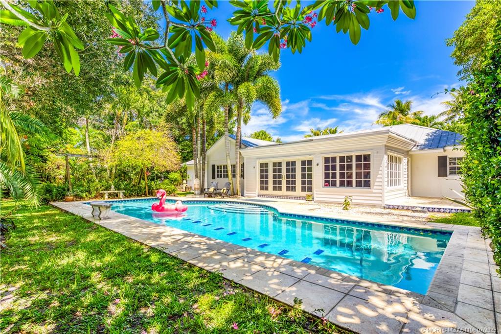 4 Emarita Way Stuart, FL 34996 - Photo 11 of 47 a front view of house with yard and green space