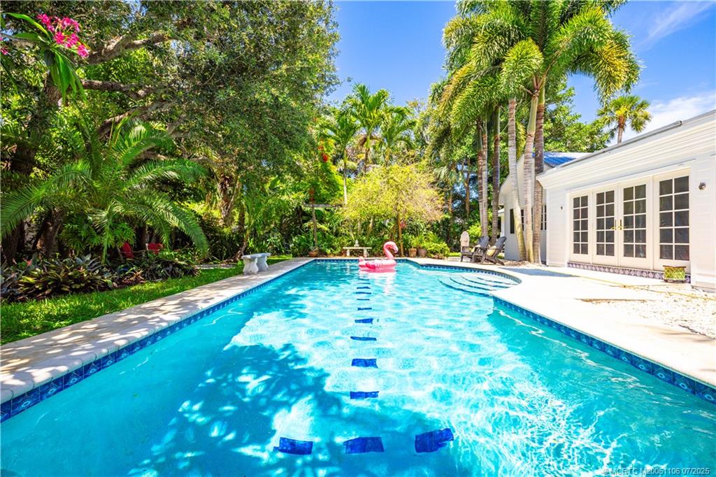 4 Emarita Way Stuart, FL 34996 - Photo 14 of 47 a view of yard with swimming pool