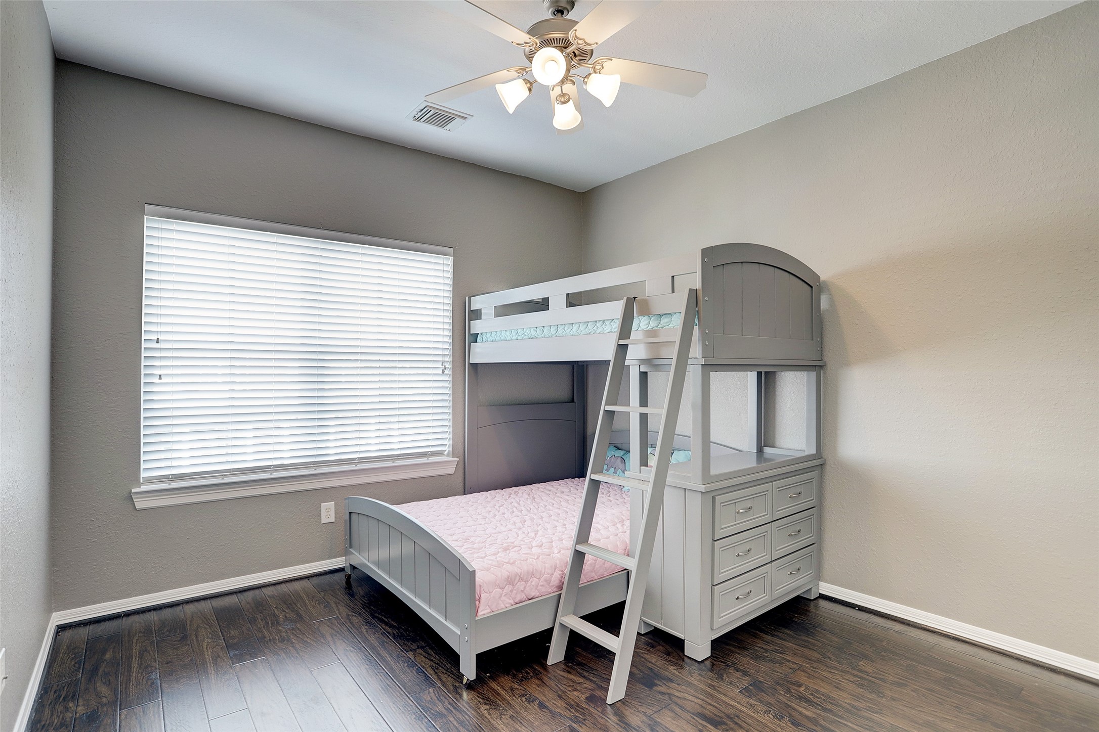10 Shell Port Square The Woodlands, TX 77380 - Photo 25 of 31 a bedroom with a bed and a window