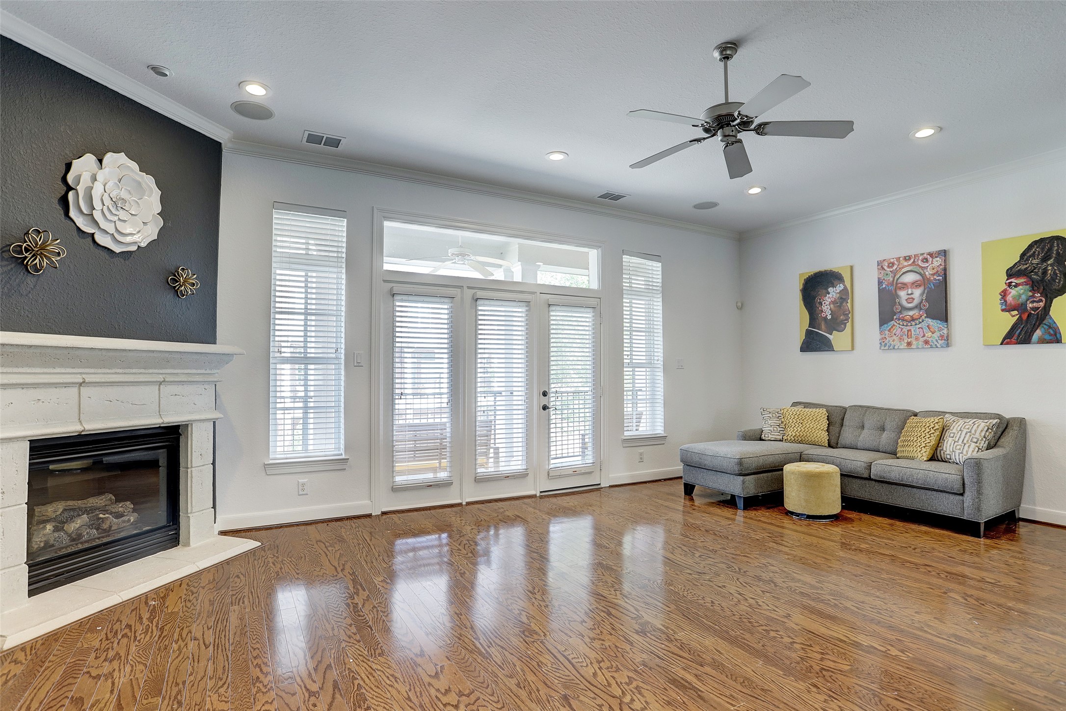 10 Shell Port Square The Woodlands, TX 77380 - Photo 3 of 31 a living room with furniture and a fireplace