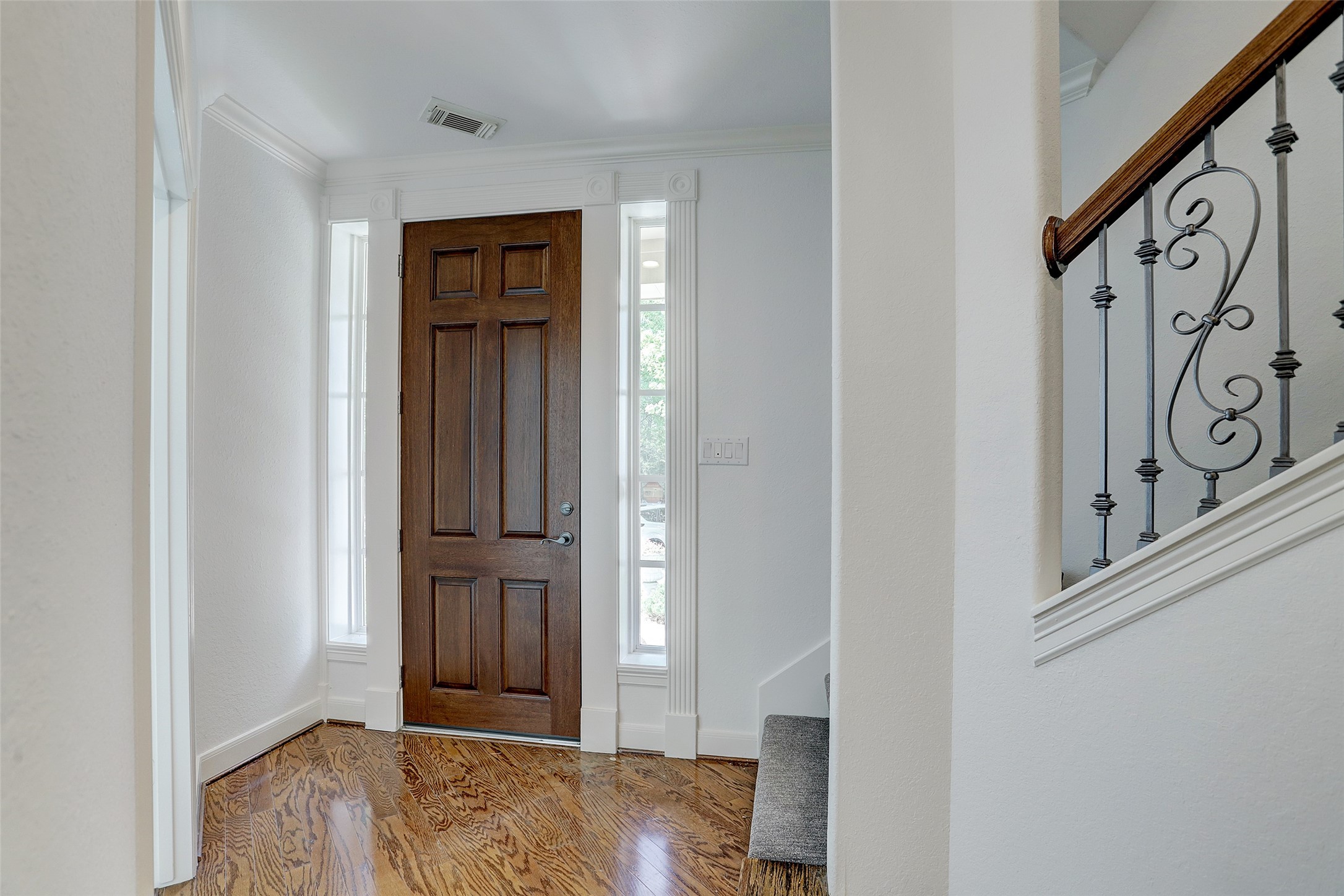 10 Shell Port Square The Woodlands, TX 77380 - Photo 7 of 31 a view of front door with wooden floor