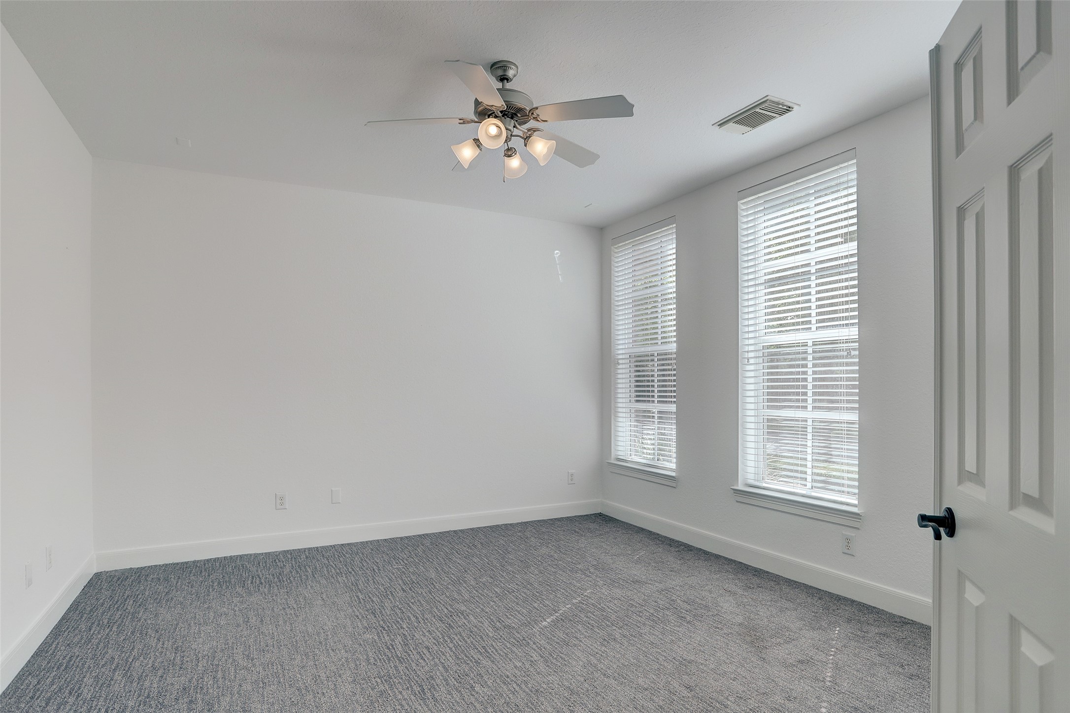 10 Shell Port Square The Woodlands, TX 77380 - Photo 8 of 31 a view of an empty room with a window