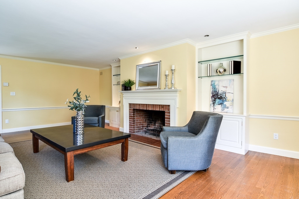 9 Buttercup Lane Dover, MA 02030 - Photo 12 of 36 a living room with furniture and a fireplace