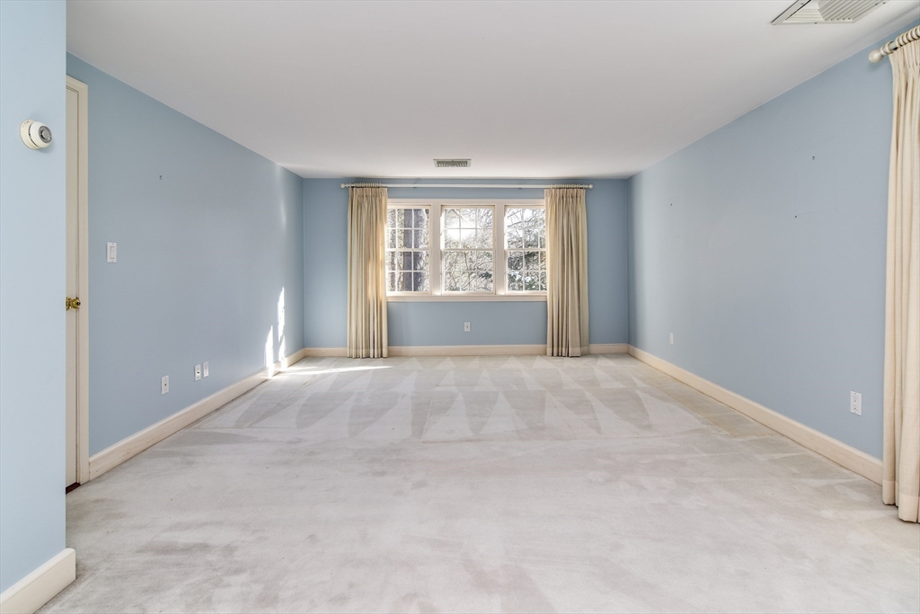 9 Buttercup Lane Dover, MA 02030 - Photo 23 of 36 a view of an empty room with a window