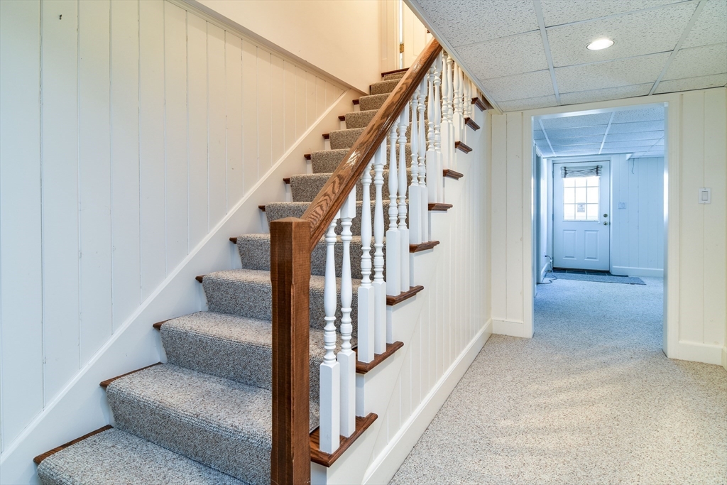 9 Buttercup Lane Dover, MA 02030 - Photo 25 of 36 a view of entryway and hall with wooden floor