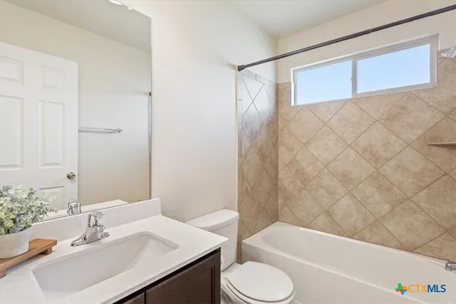 a view of storage and utility room with empty racks