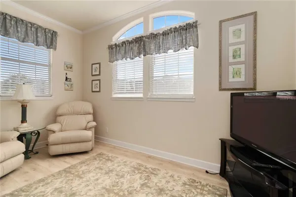 a living room with furniture and a window