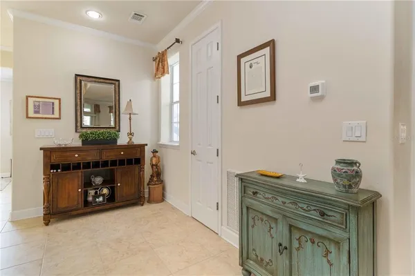 a view of room with window and cabinet