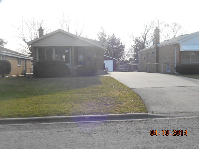 515 High Ridge Road Hillside, IL 60162 - Photo 1 of 1 a front view of a house with a yard