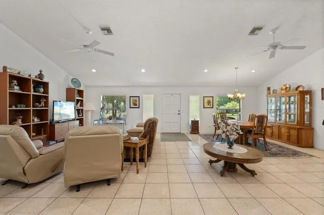 a kitchen with stainless steel appliances granite countertop a sink stove and microwave