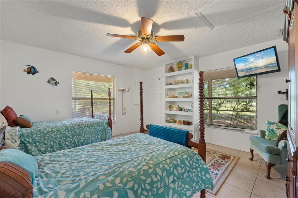 13719 Seminole Trail Wimauma, FL 33598 - Photo 25 of 68 a bedroom with a bed and a window
