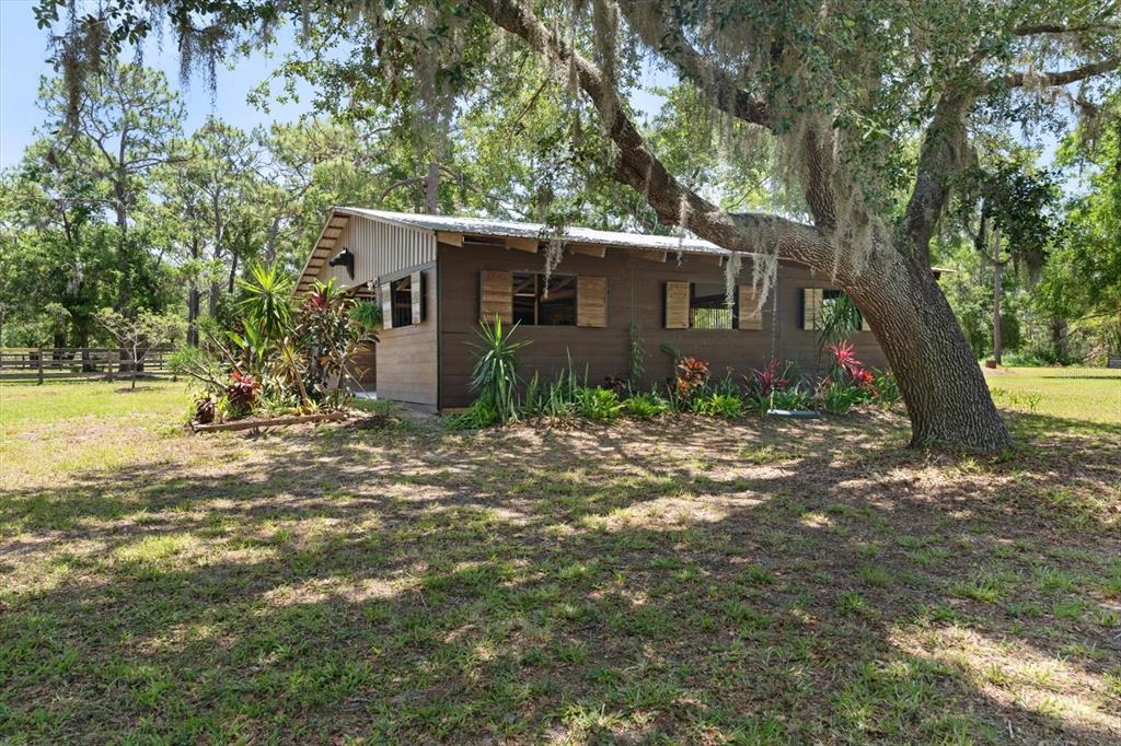 13719 Seminole Trail Wimauma, FL 33598 - Photo 43 of 68 a view of a house with a yard