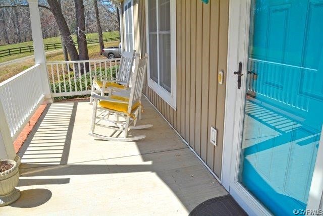 399 Chellowe Road Dillwyn, VA 23936 - Photo 36 of 50 a view of balcony and wooden floor