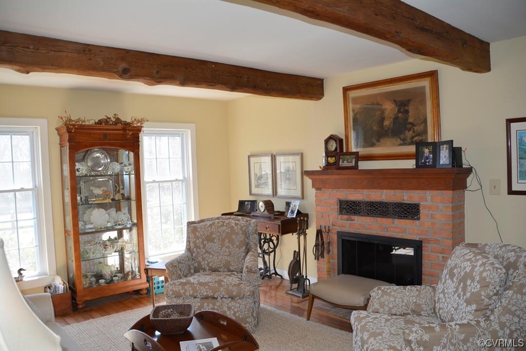 399 Chellowe Road Dillwyn, VA 23936 - Photo 4 of 50 a living room with furniture and a fireplace