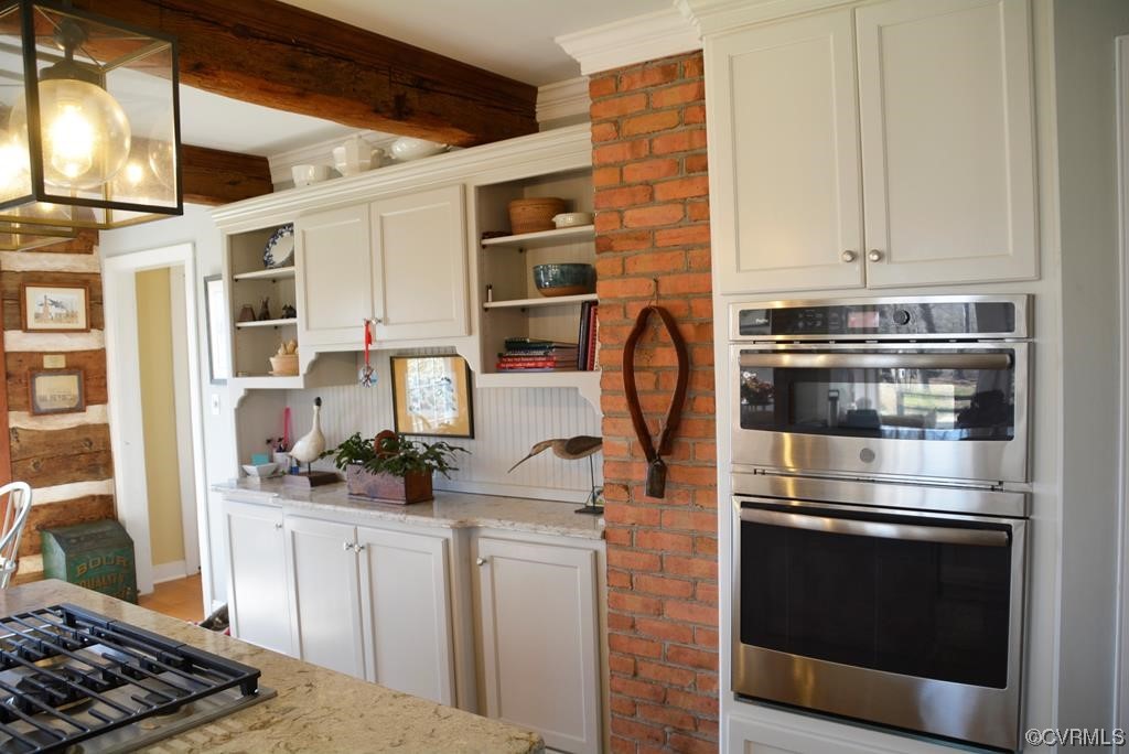 399 Chellowe Road Dillwyn, VA 23936 - Photo 8 of 50 a kitchen with stainless steel appliances granite countertop a stove and a microwave
