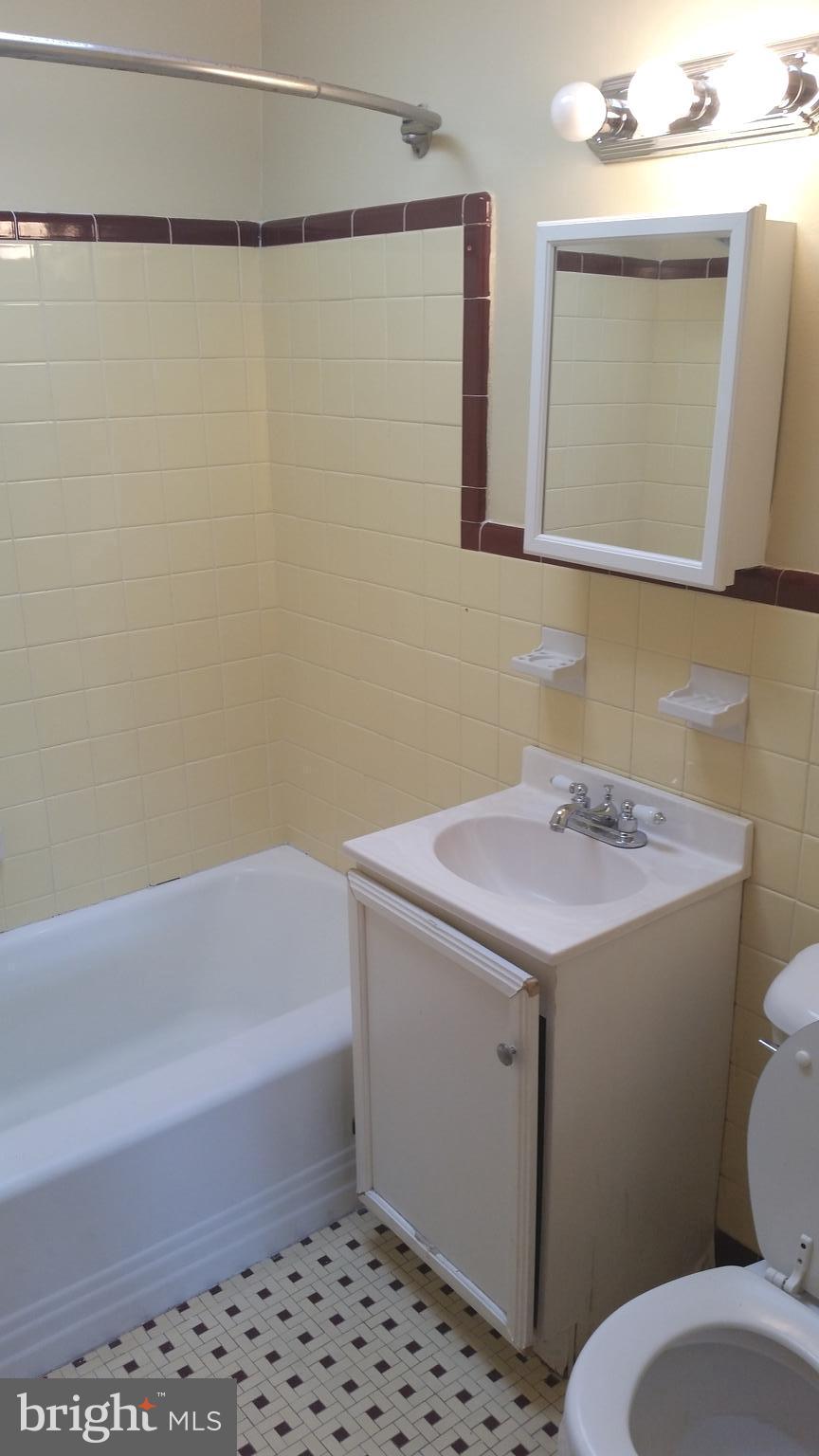 3612 Winona Street Philadelphia, PA 19129 - Photo 9 of 10 a bathroom with a sink toilet and shower