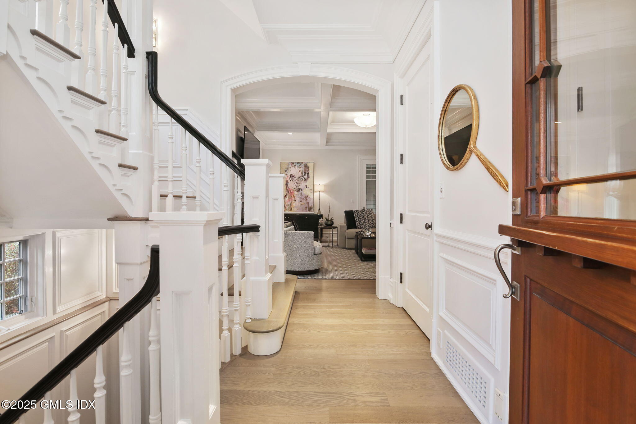 50 Sound View Drive, Unit 4N Greenwich, CT 06830 - Photo 2 of 20 a view of a hallway with wooden floor and entryway